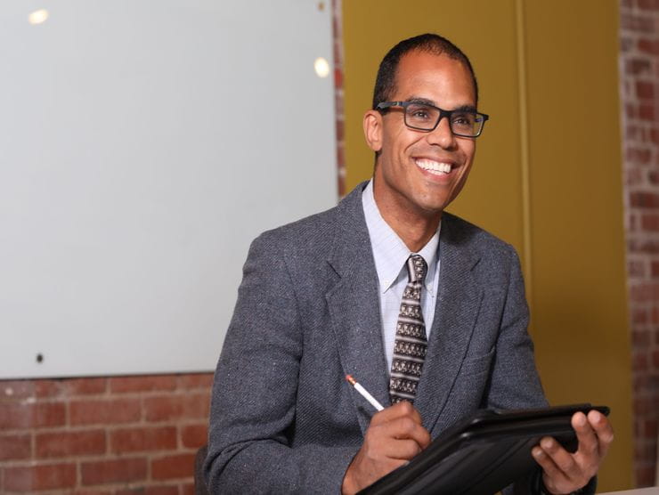 man sitting with laptop