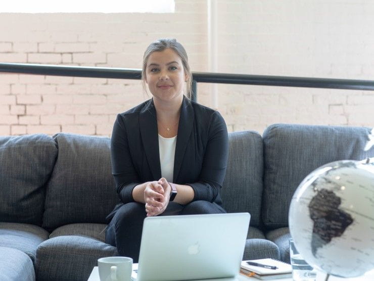 woman sitting on couch 