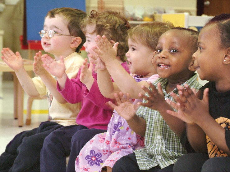 kids sitting and clapping 