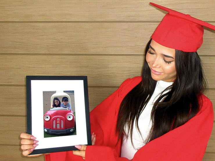 Hannah with a photo 