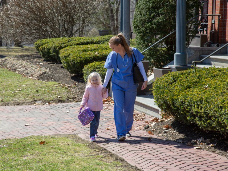 mom walking with daughter