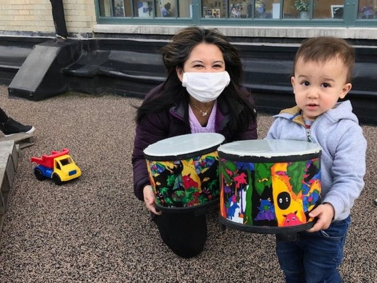 boy and teacher with mask