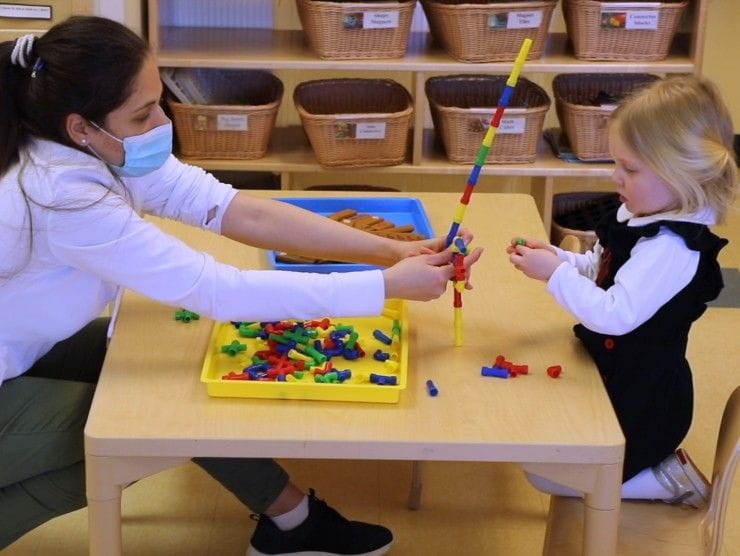 teacher with child