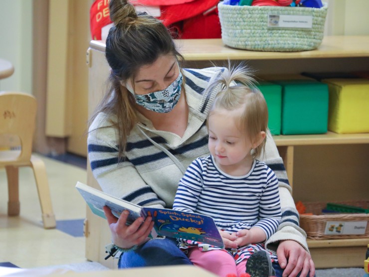 teacher reading to child