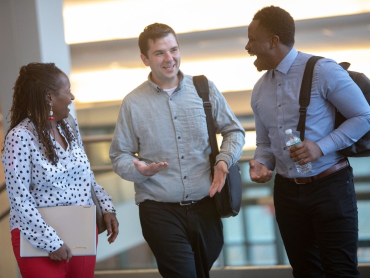 adult learners walking and talking 