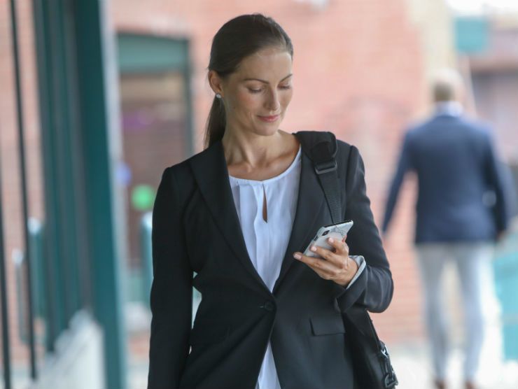 Female employee checking her phone
