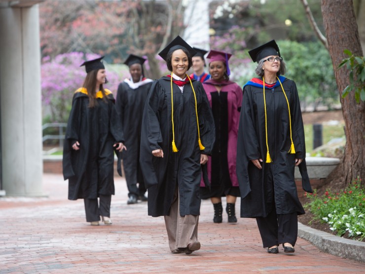 college graduates walking 