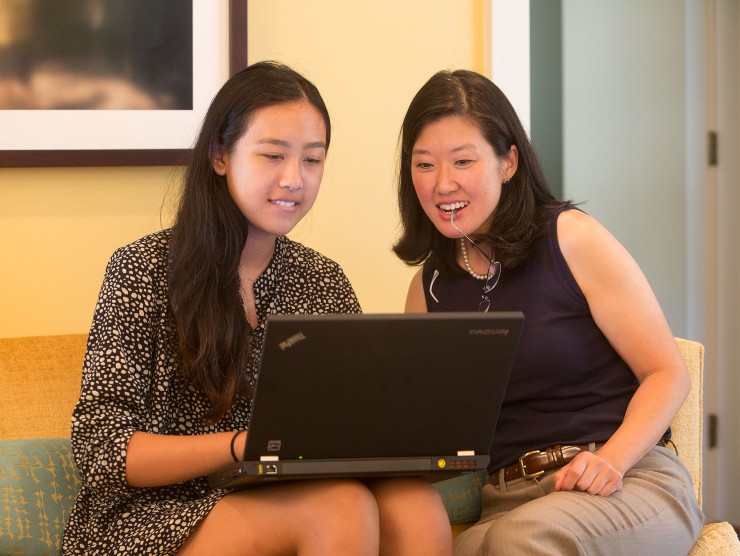 mother and daughter with laptop