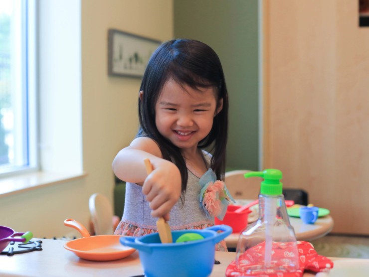 child playing at table 