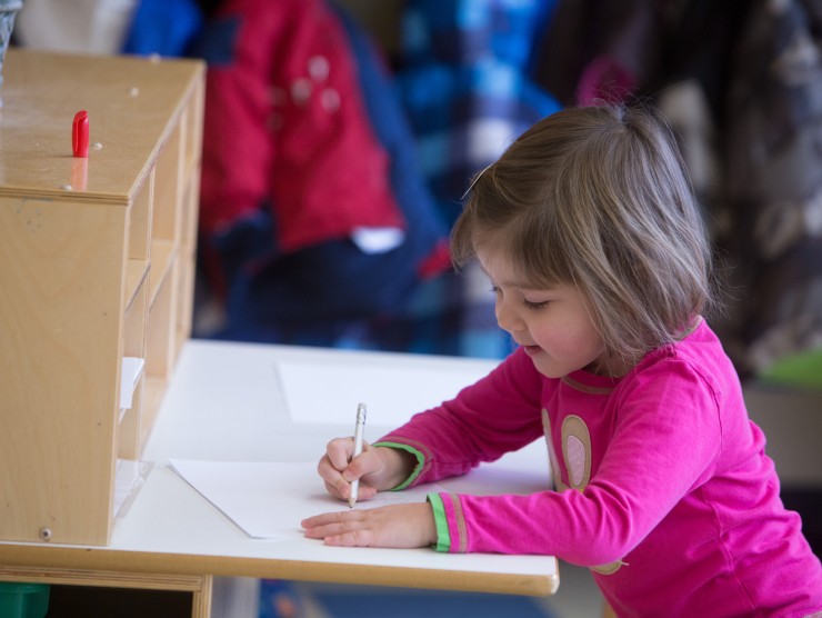 child at desk 