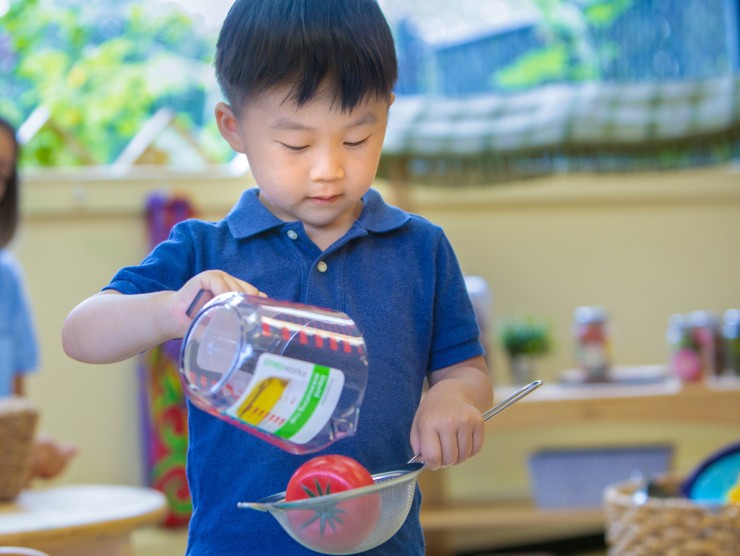 boy playing at table 