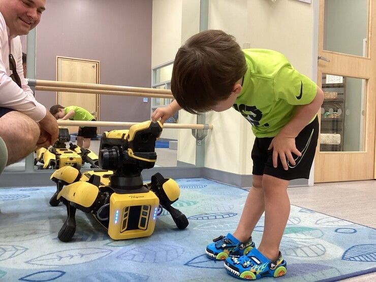 child with robot 