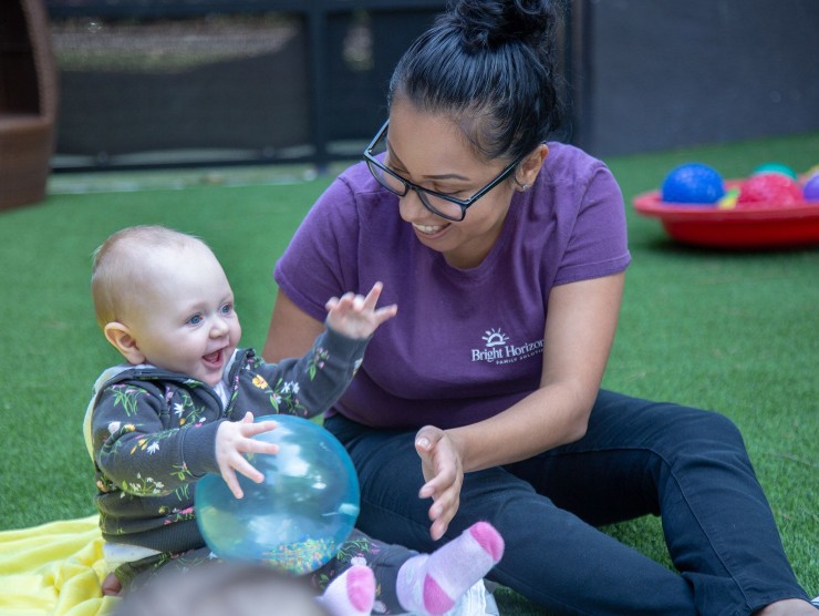 teacher with child outside 