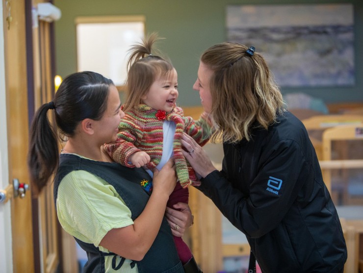 mom dropping off child to center 