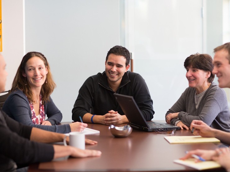 co-workers sitting at a table 