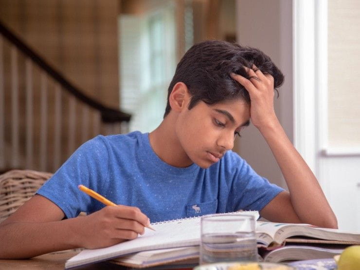 teenager with books 