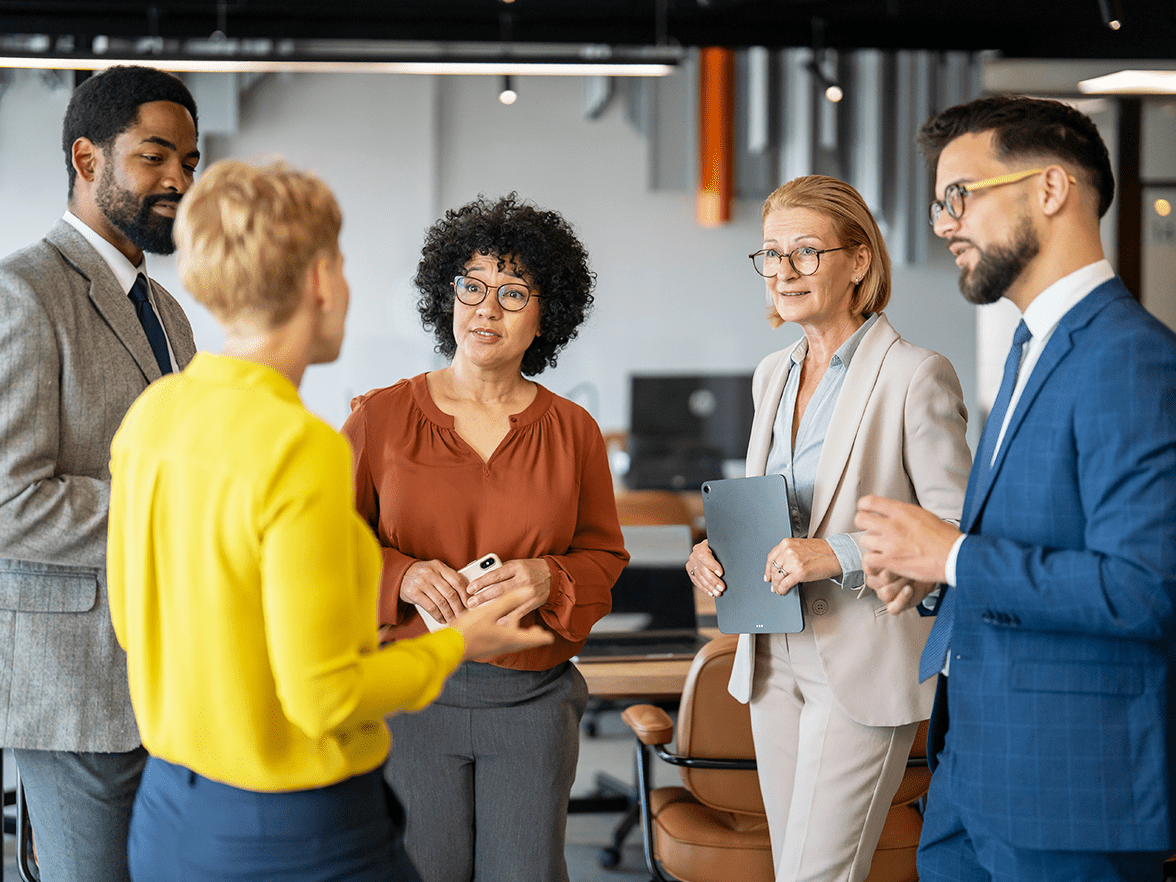 Group of coworkers discussing strategy