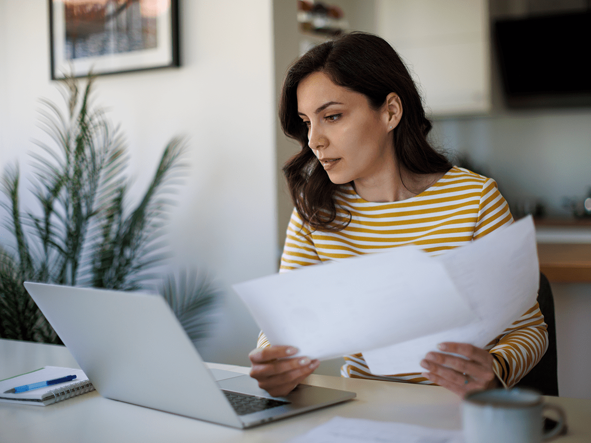 Staff member reviewing documentation
