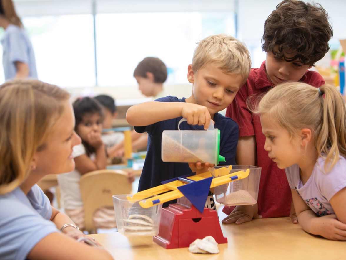 Kids working on a science project in a classroom