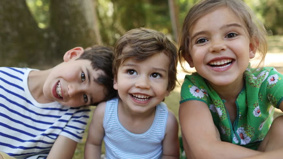 Three children playing after school