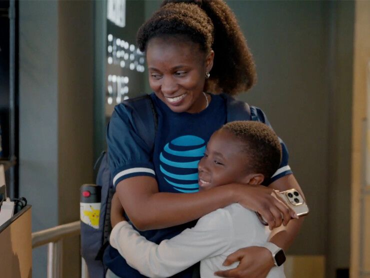 Mother and son hugging