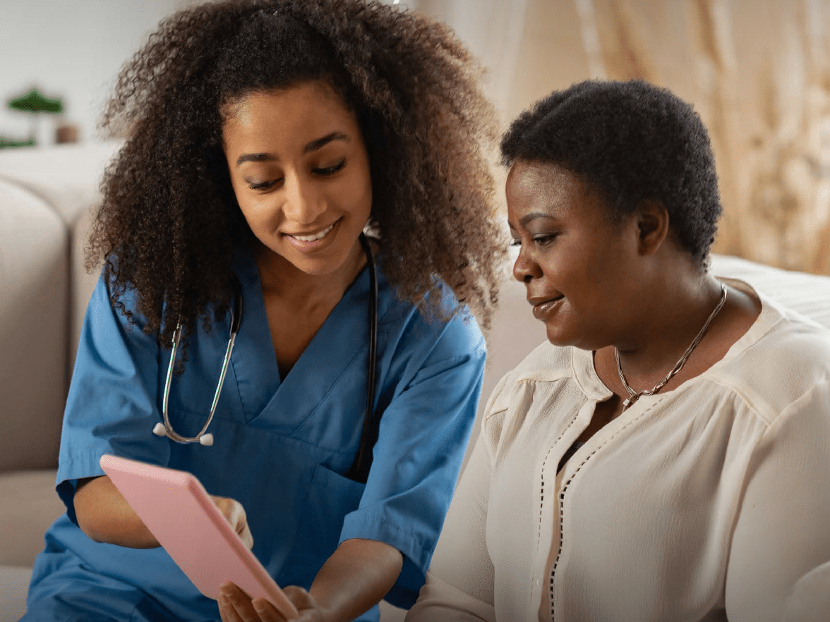 A female doctor speaking with a patient