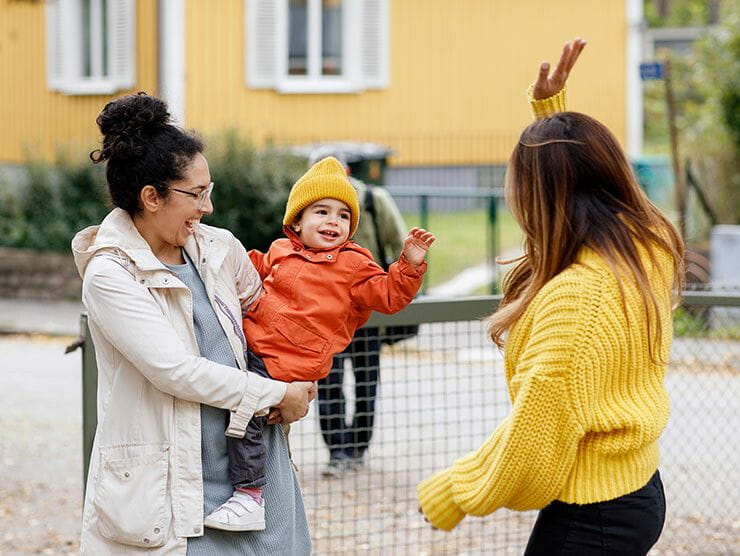 Mom dropping off child at daycare