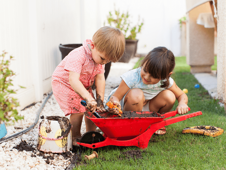 Two children playing outside