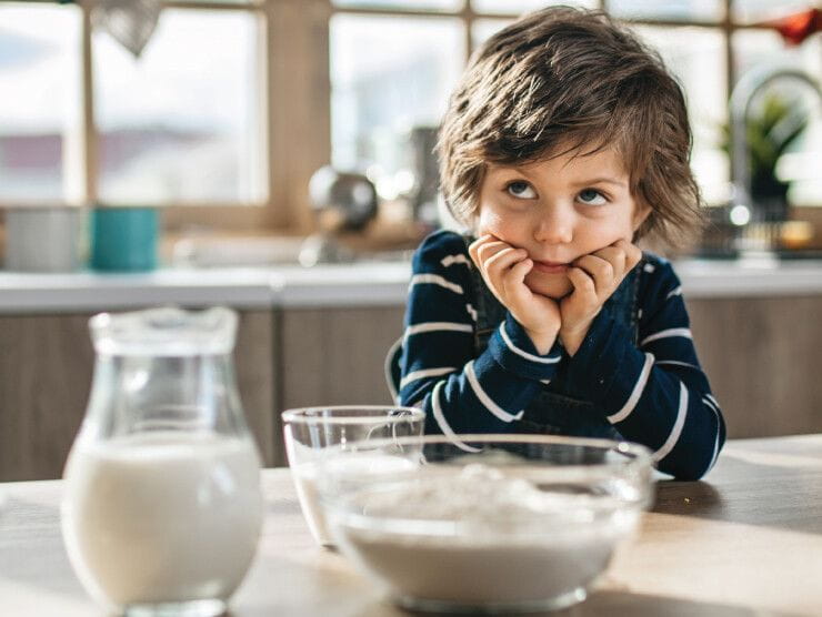 Boy waiting at the kitchen table