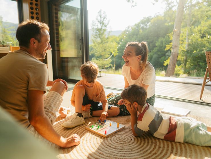 Family playing a board game