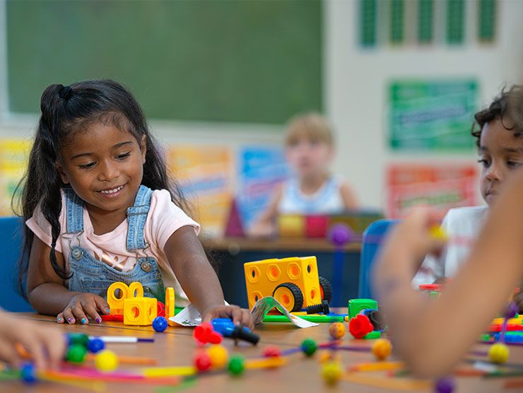 Young children playing with blocks