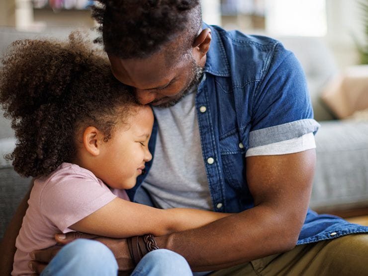 Father and daughter hugging