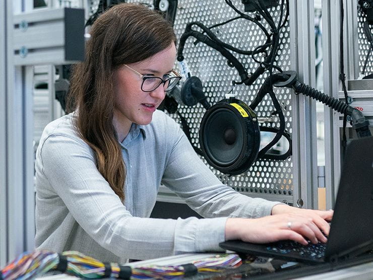 Woman typing on computer