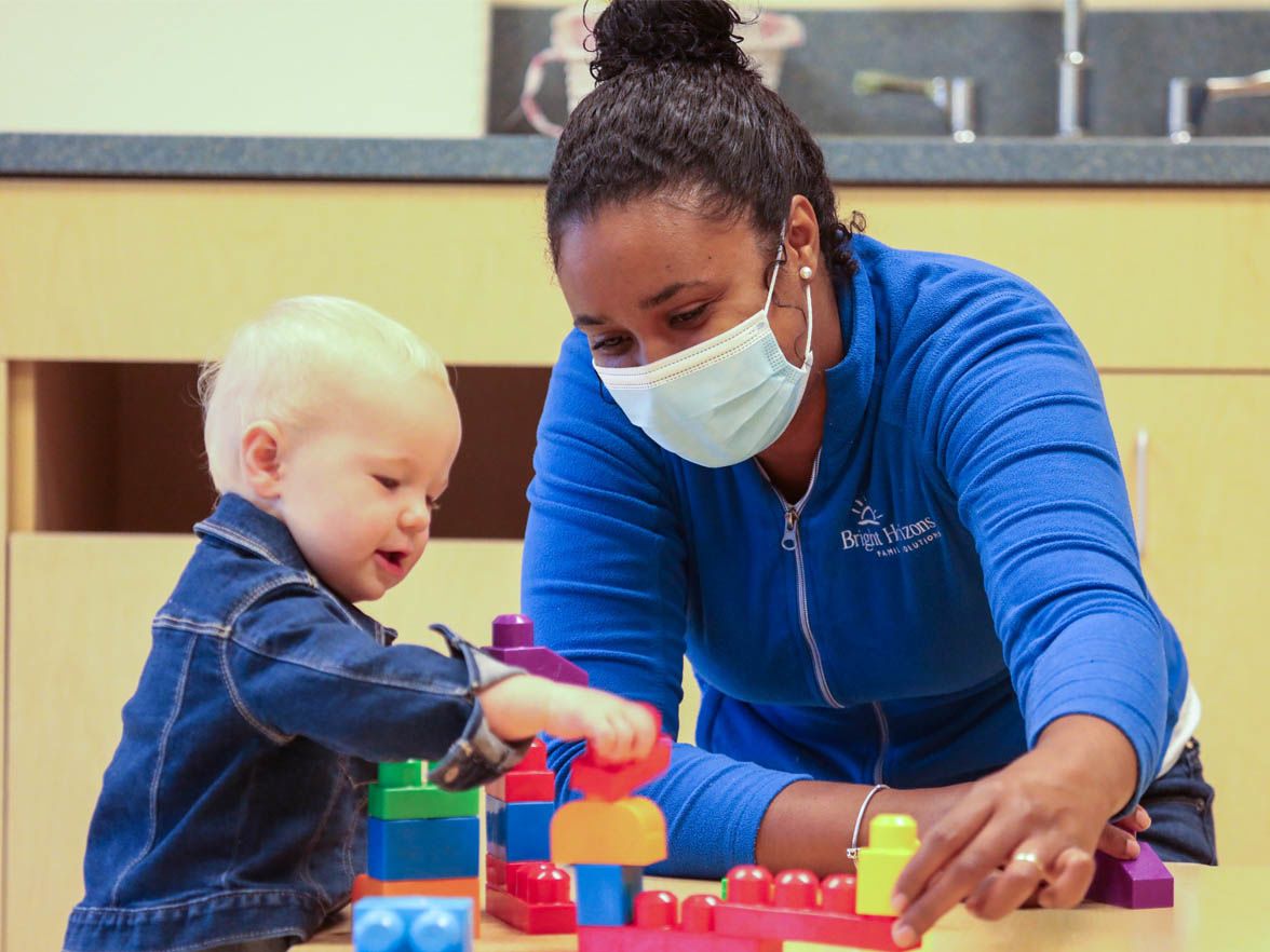 Bright Horizons daycare teacher with toddler