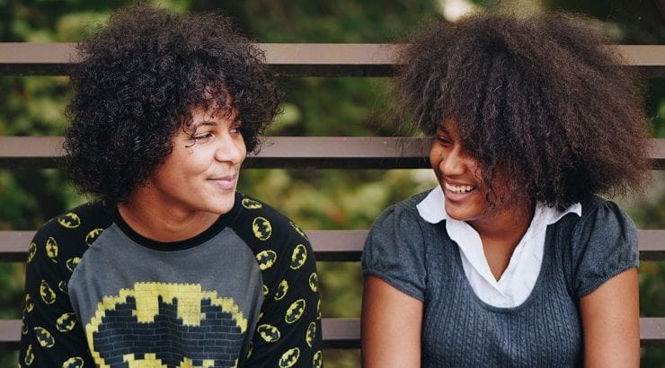 boy and girl smiling at each other