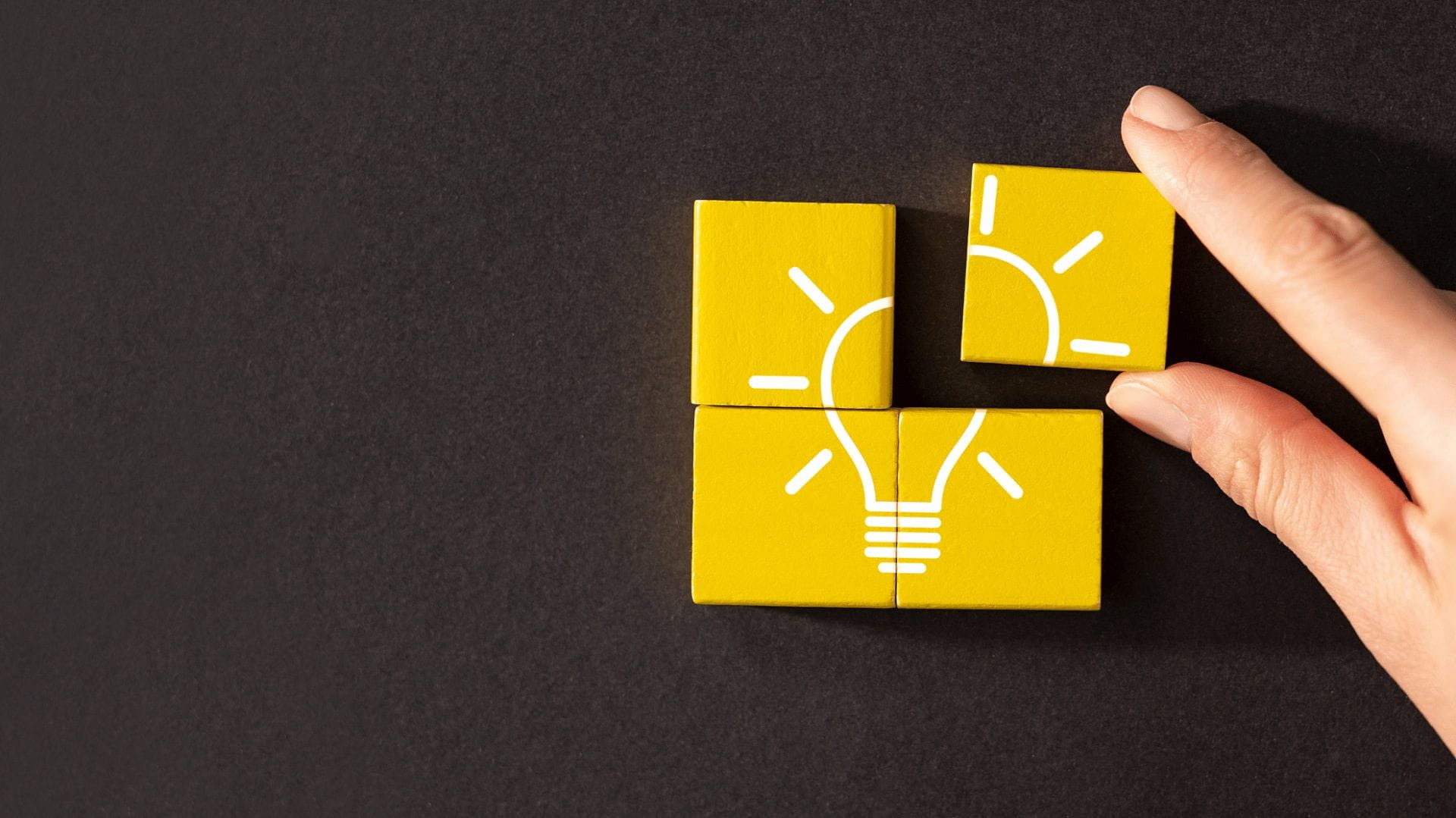 adding the last piece of a lightbulb puzzle