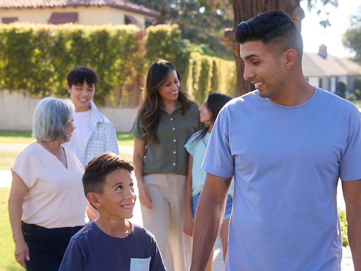 A family walking down the street