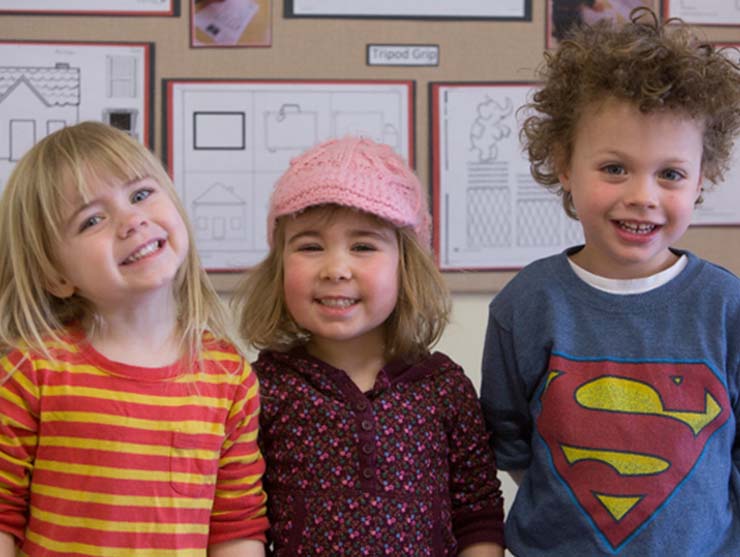 set of 3 kids smiling with courage