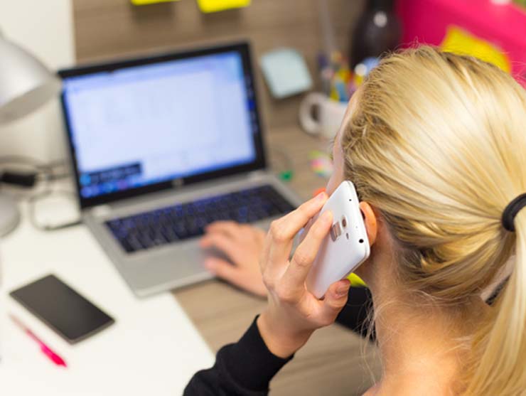 working mom working in her home office