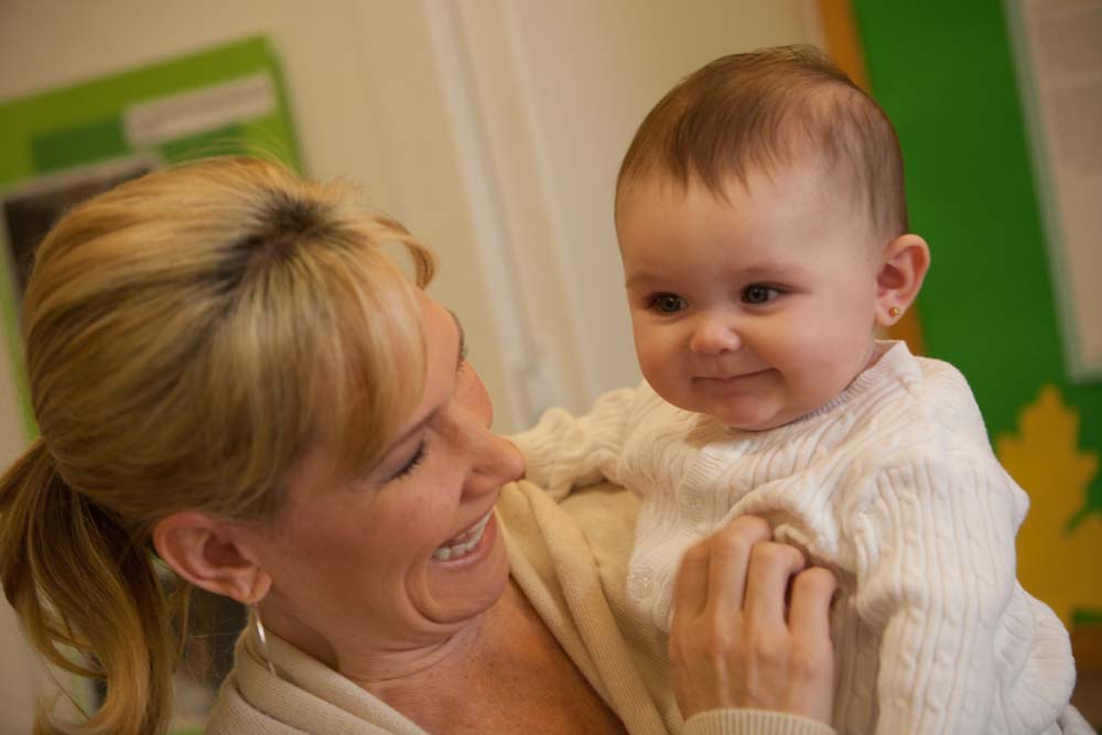 Editor discussing work-life balance challenges with a focus on mothers in the workplace