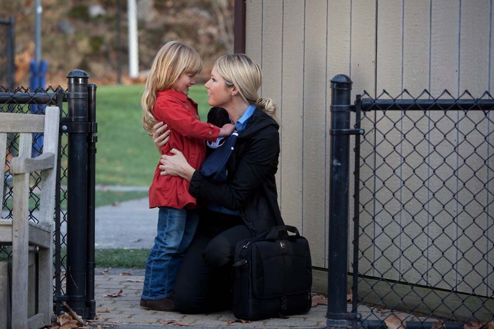 Businesswoman balancing work and family responsibilities