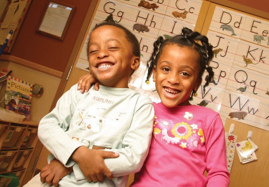 Brother and sister playing together at a Bright Horizons care center