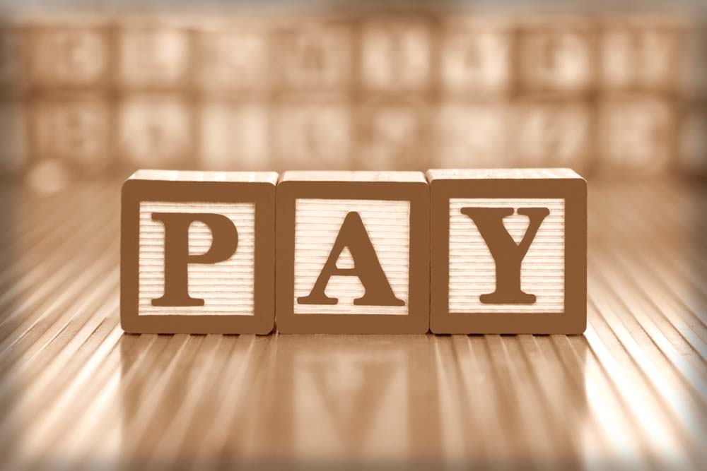 Discussing employee dissatisfaction with compensation.