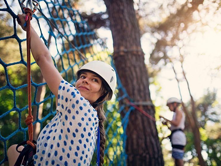 A girl doing a teen-friendly outdoors activity.