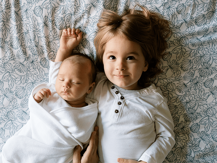 A child and a newborn together