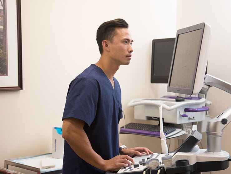 Doctor working on computer