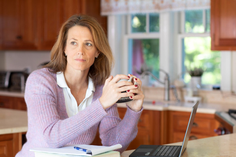 Women working from home due to COVID-19