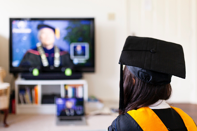 Adult learner attending her higher education merger virtual graduation