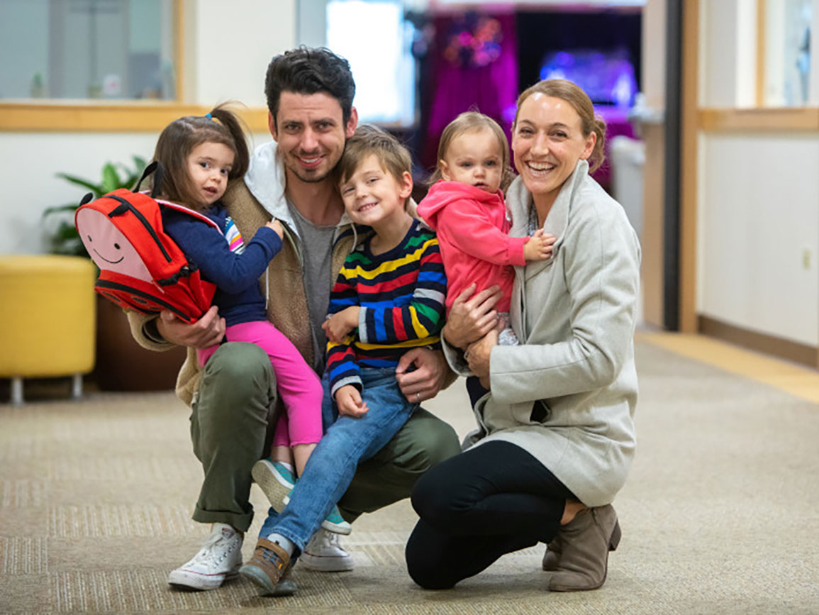 Family of five at a child care center