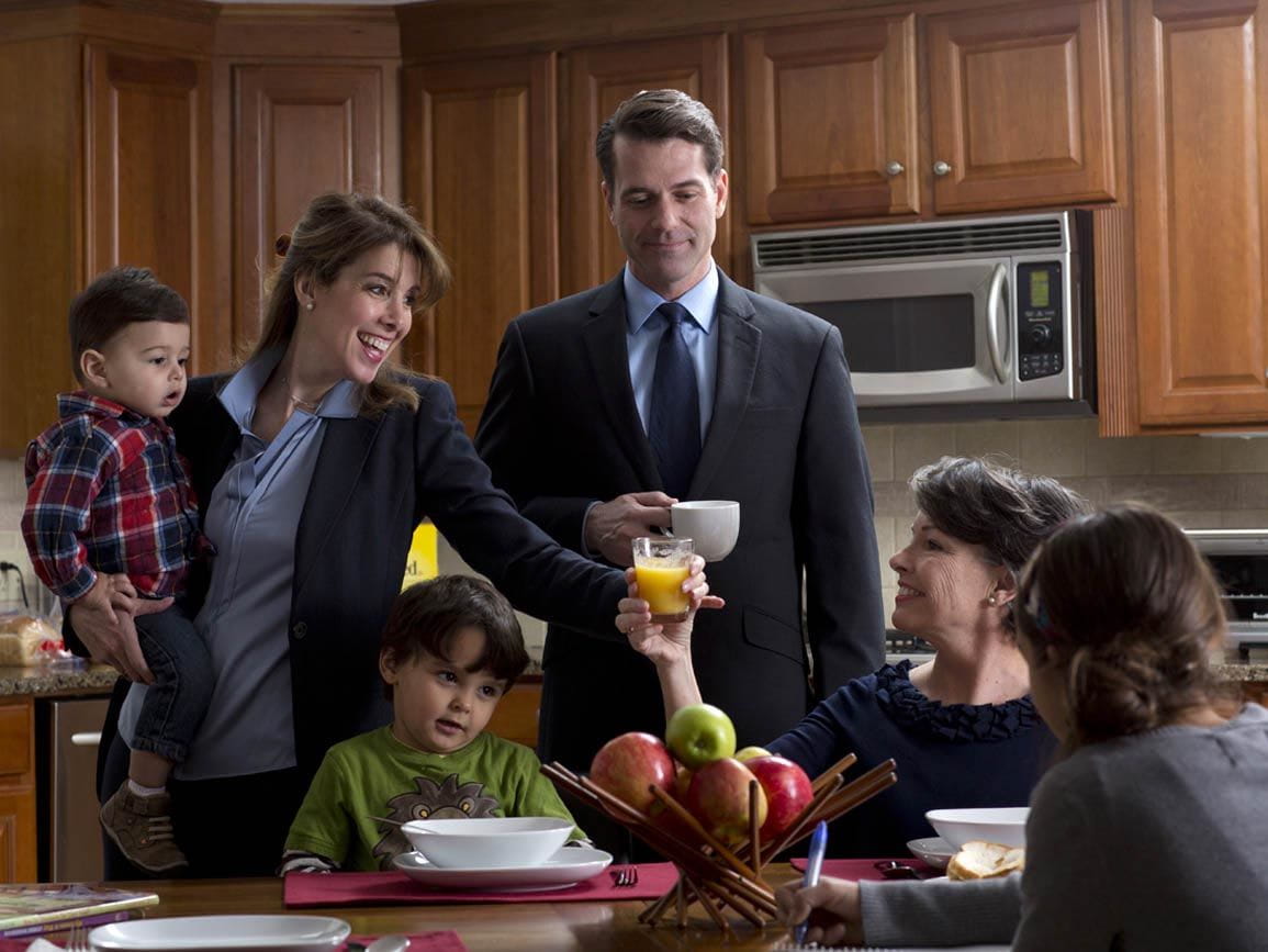 A large multi-generational family at the breakfast table